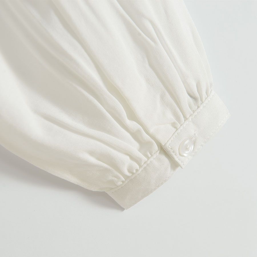 White long sleeve shirt with raffles