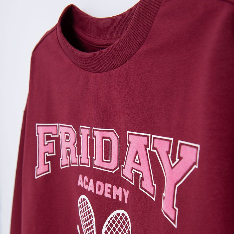 Burgundy sweater with tennis theme