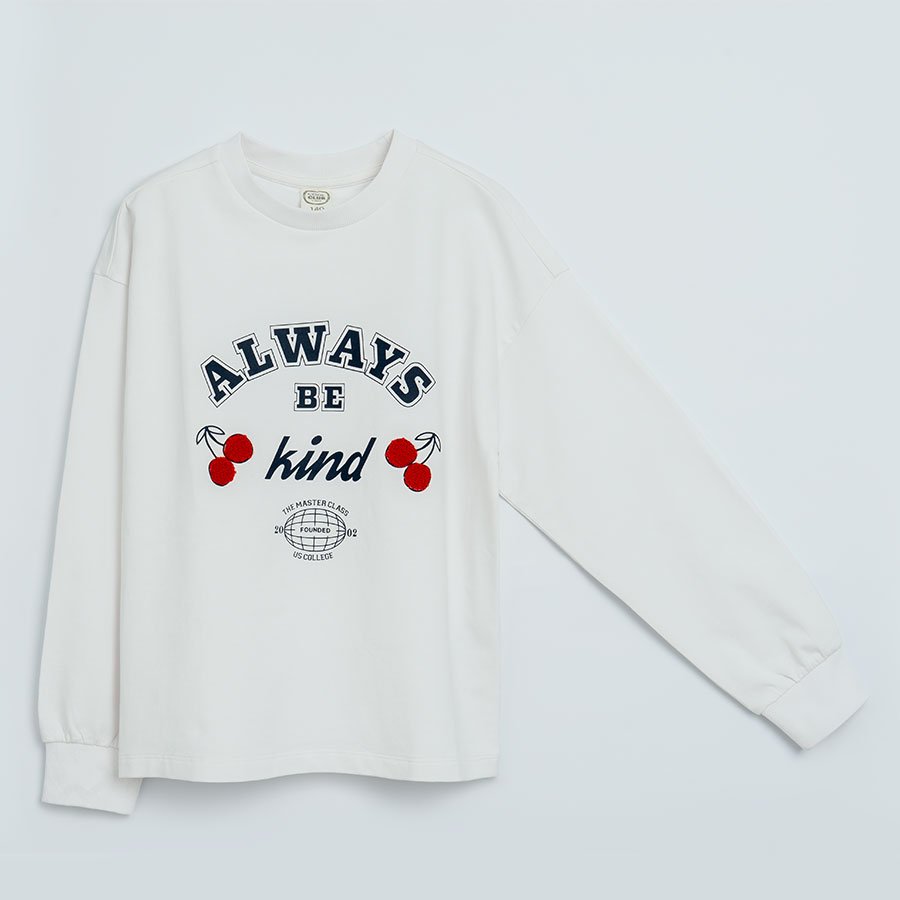 White sweatshirt with cherries and 'Always be kind' print