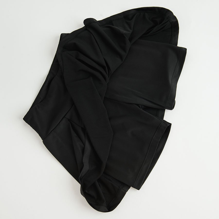 Black shorts with pleated skirt on top