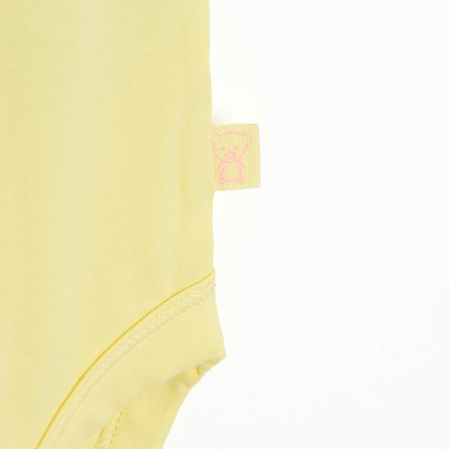 Light yellow short sleeve bodysuit with jungle animals print