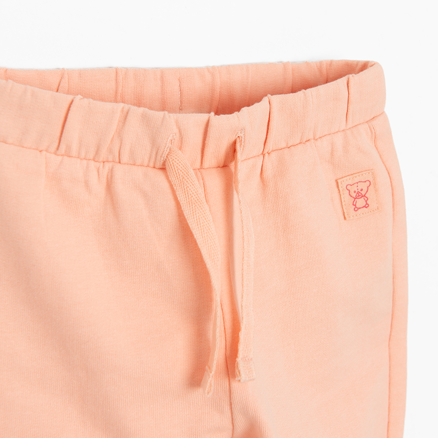 Peach jogging pants with jellyfish print and cord