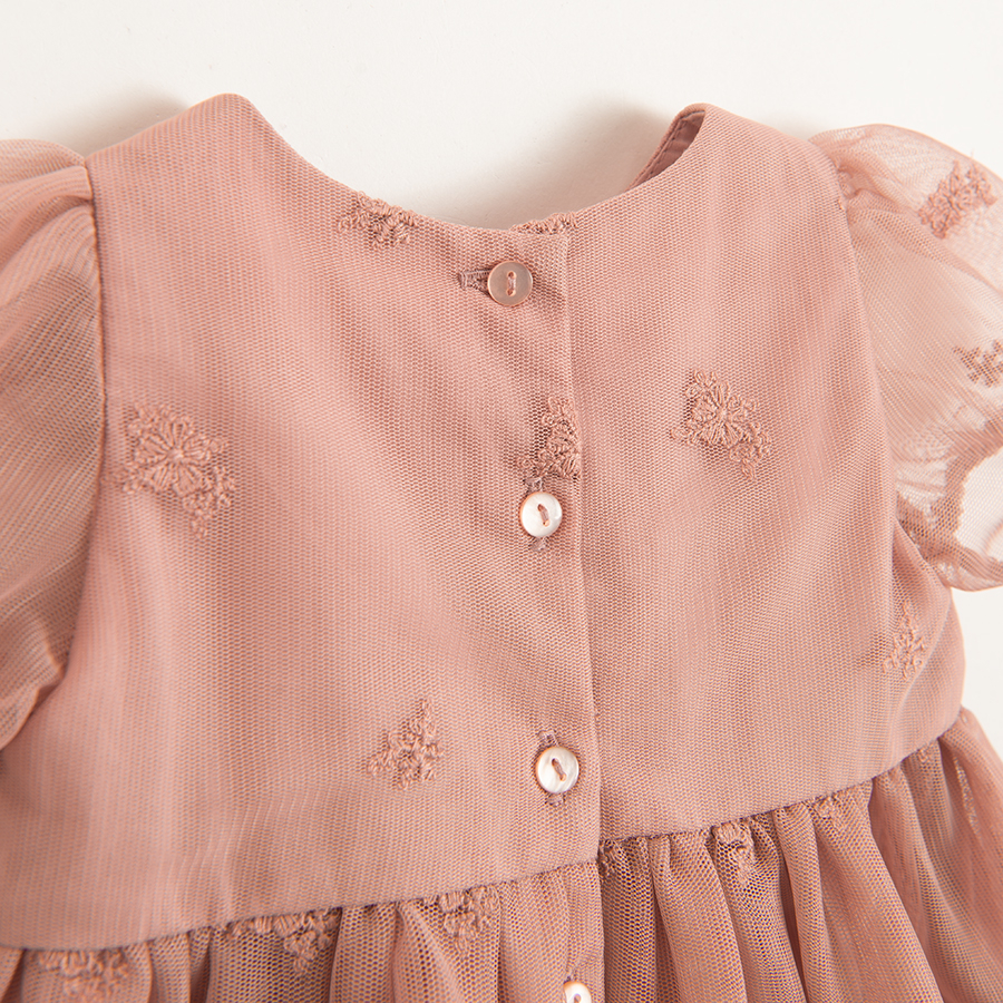 Dusty pink dress with puffly short sleeves and ruffles