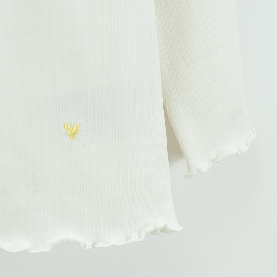 White long sleeve blouse with hearts print