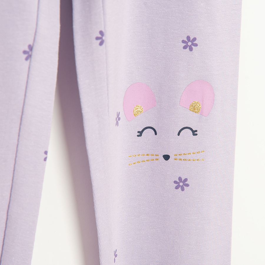 Purple leggings with kitten face print on knees