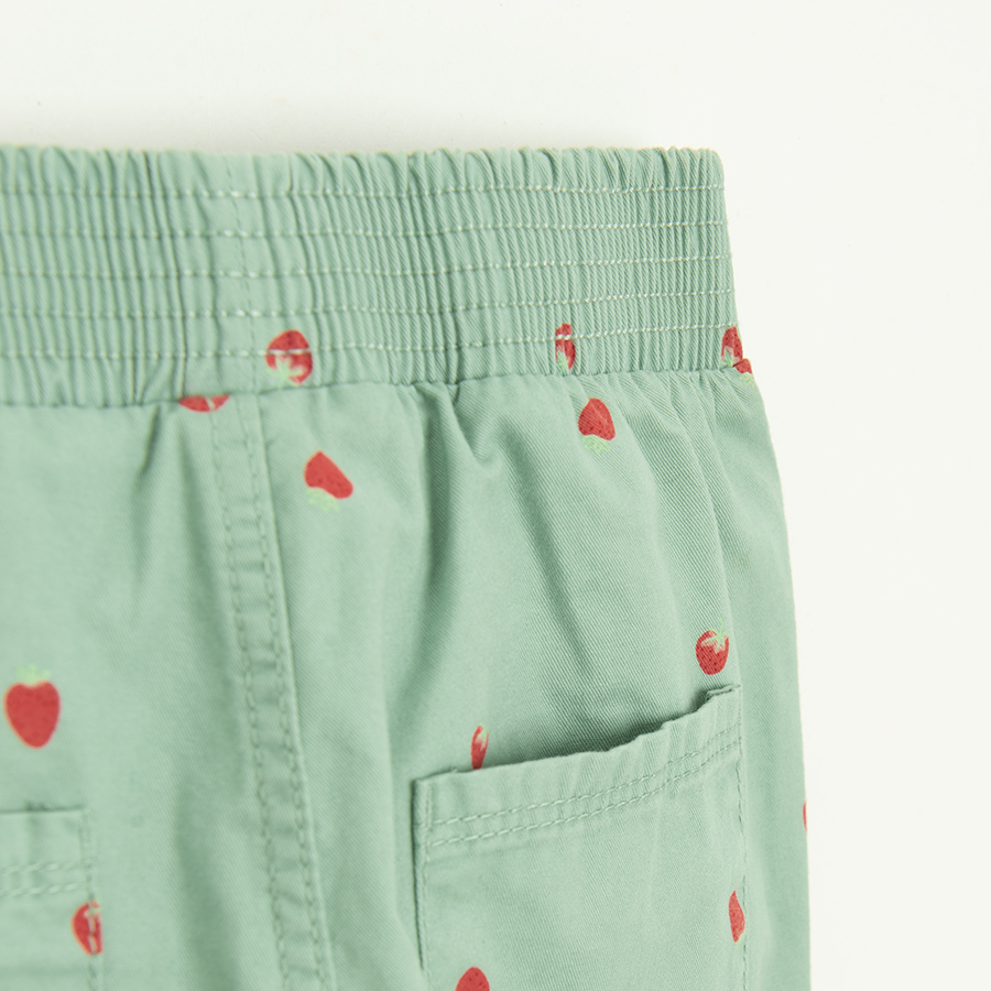Green sweatpants with strawberries print