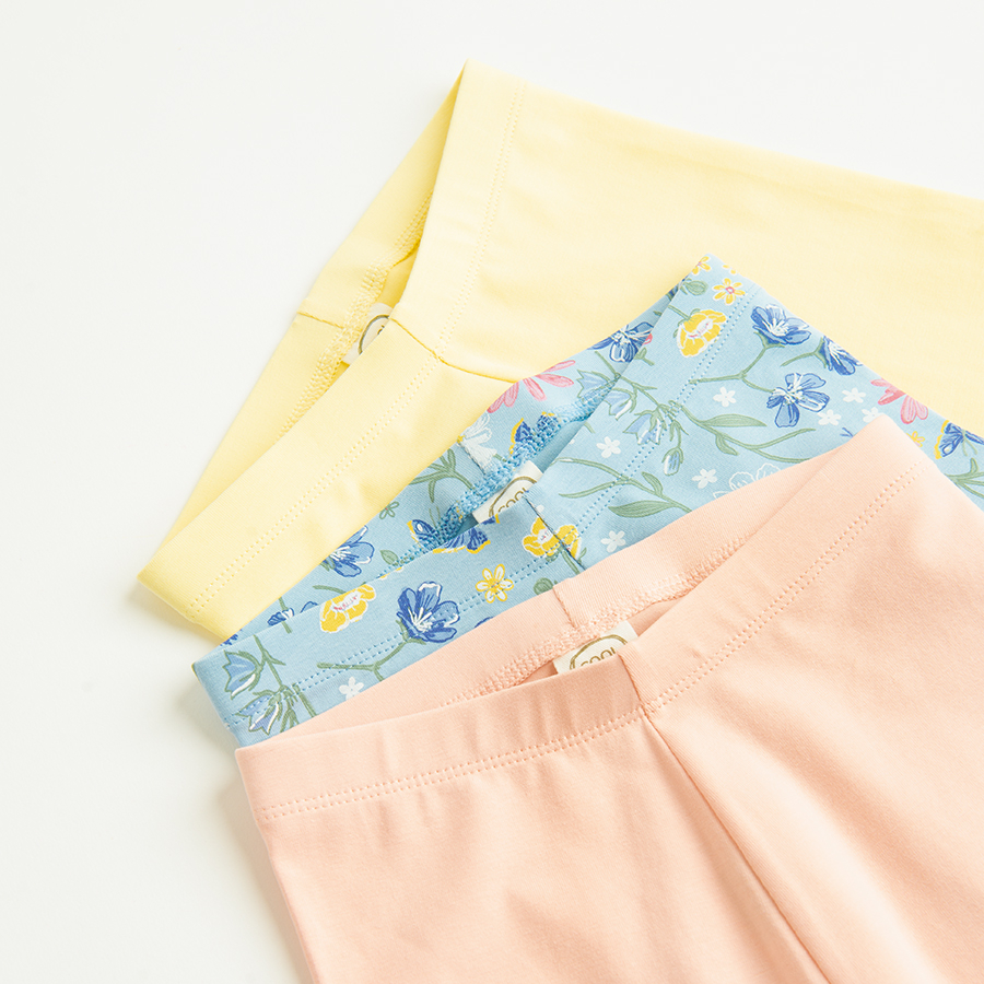 Pink, yellow, blue leggings with flowers and daisies print