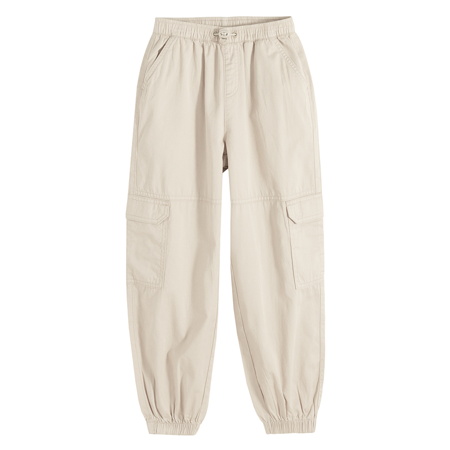 Beige wide pants with side pockets