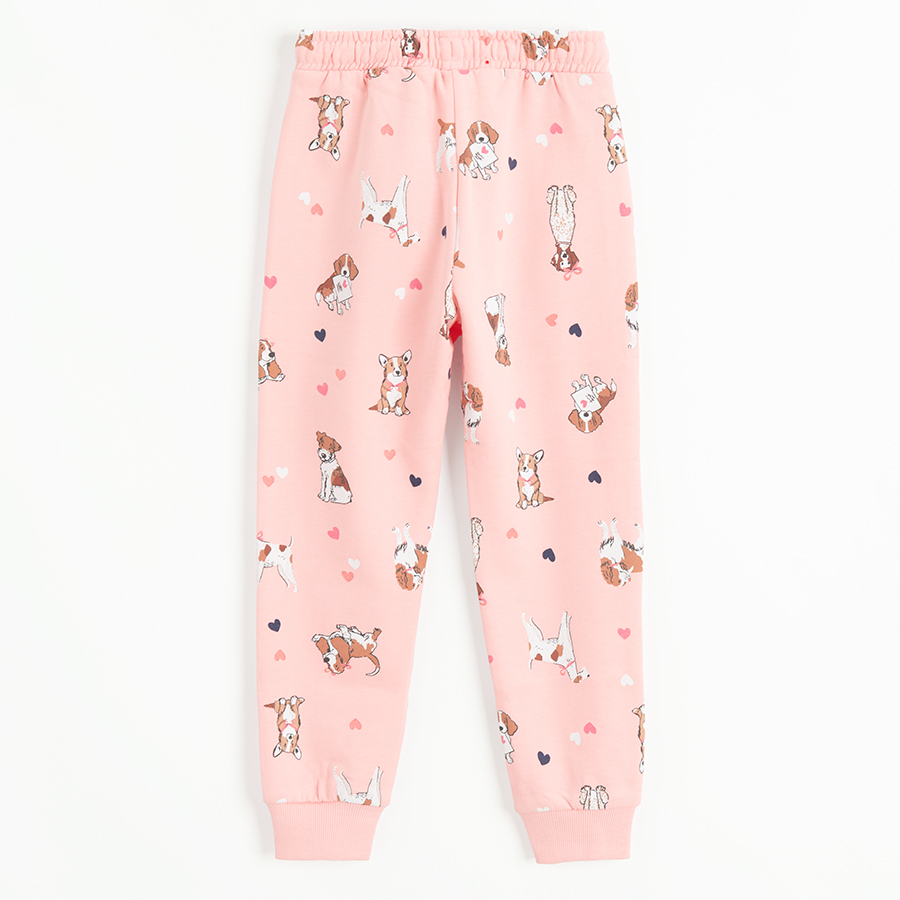 Pink jogging pants with dogs print