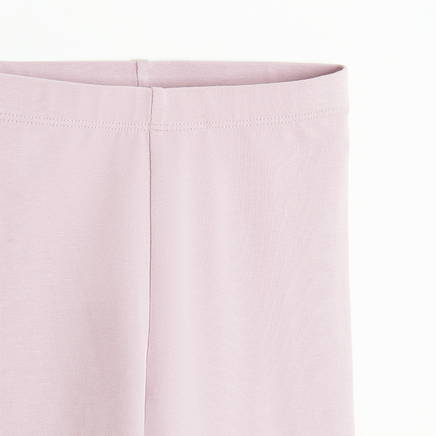 Violet leggings with plam fruit on the knees