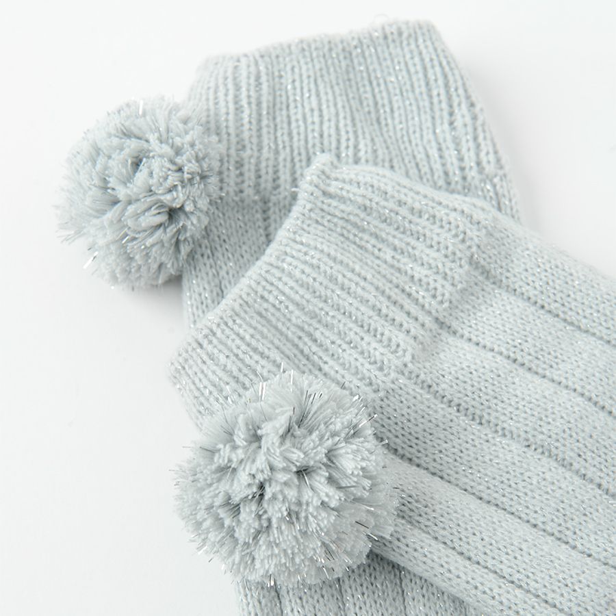 Grey warmers with pom poms