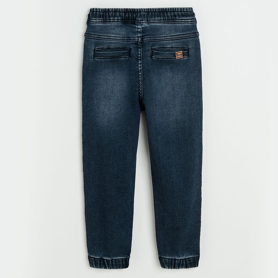 Denim trousers with adjustable waist