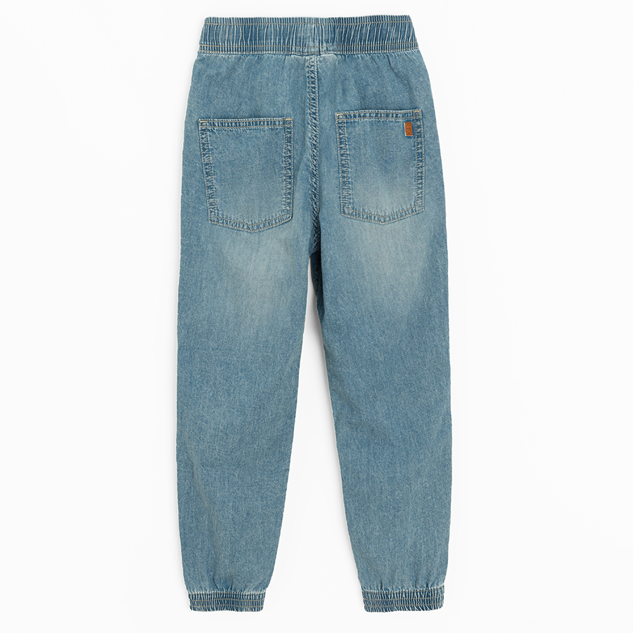 Denim trousers with cord