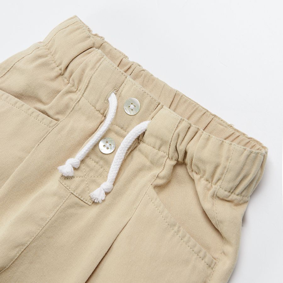 Beige trousers with elastic waist and cord