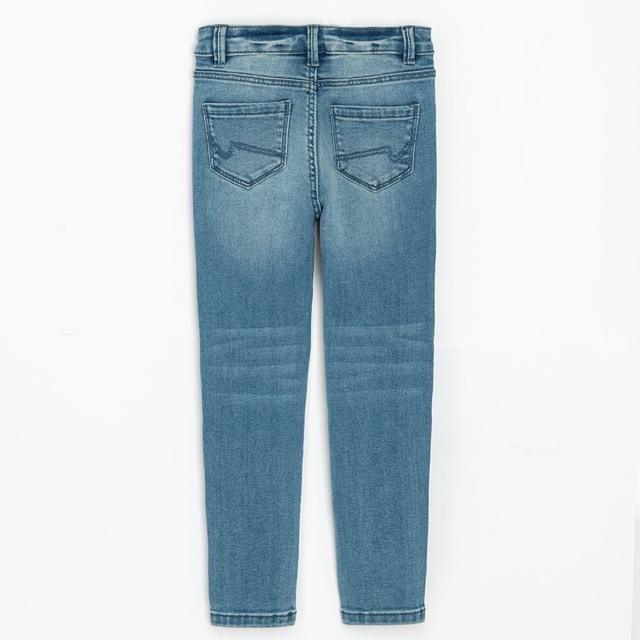 Denim trousers with small cats face embroidered