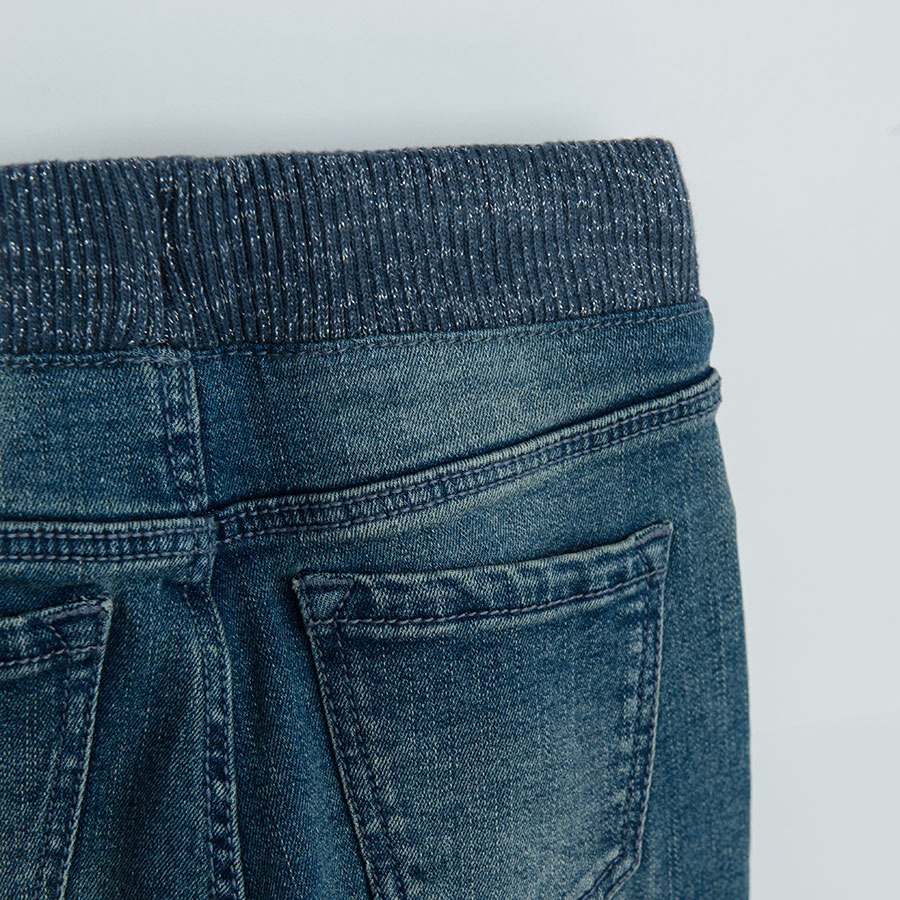 Denim trousers with floral lining