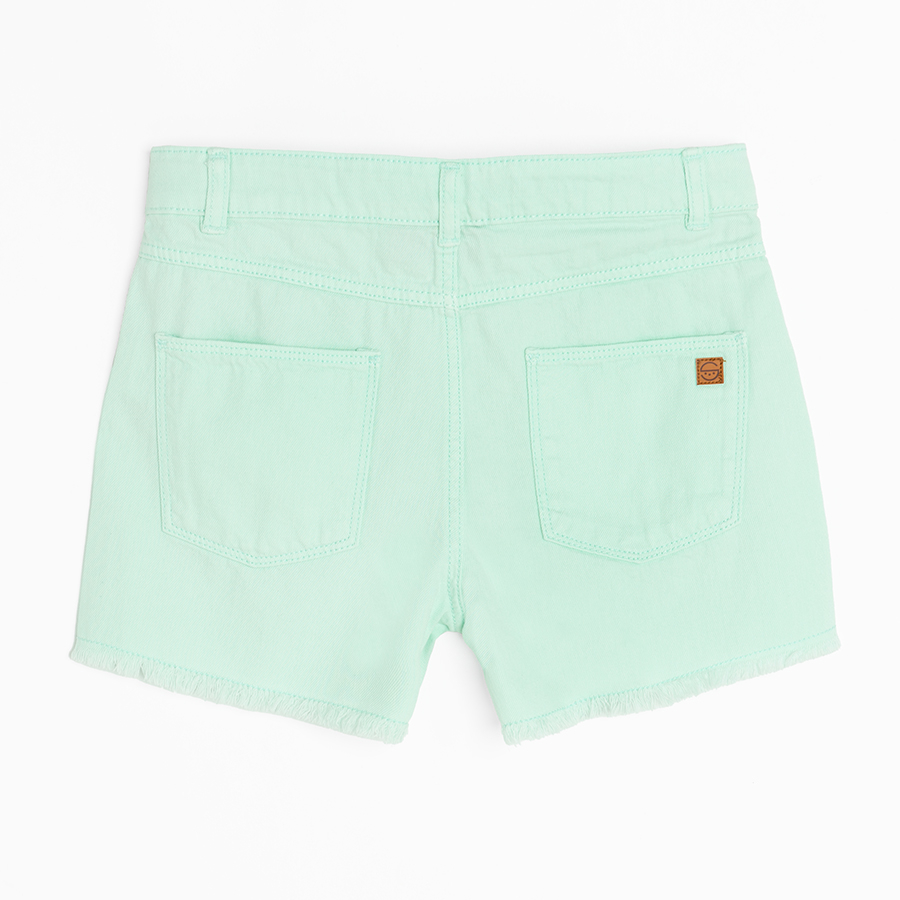 Turquoise denim shorts with back pockets on the front