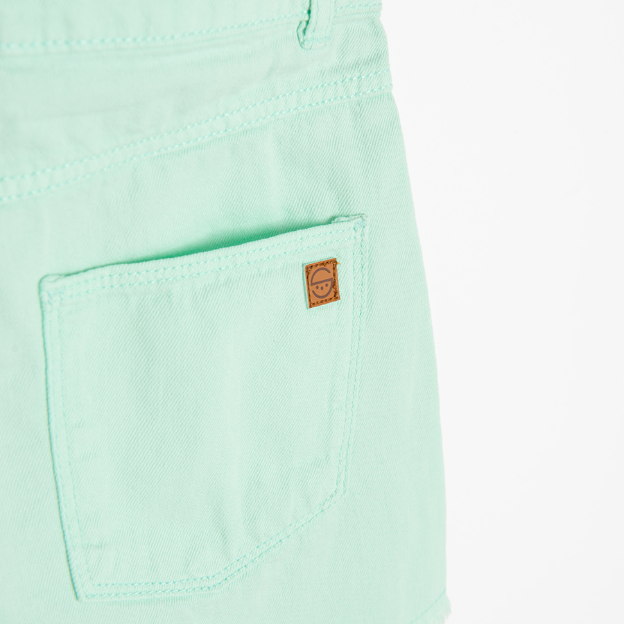 Turquoise denim shorts with back pockets on the front