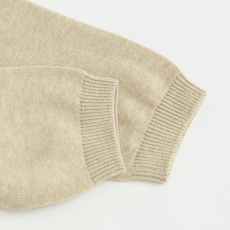 Ecru footless leggings with bear face on the knees