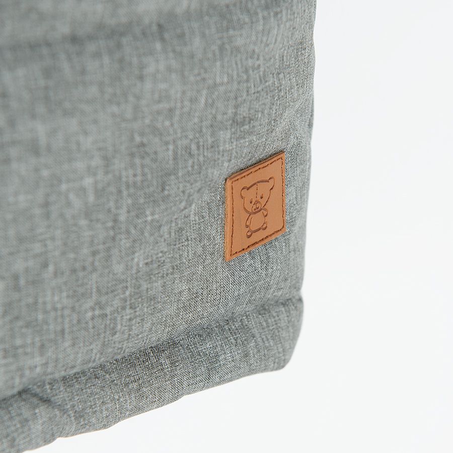 Grey and brown jacket with fur on the hood