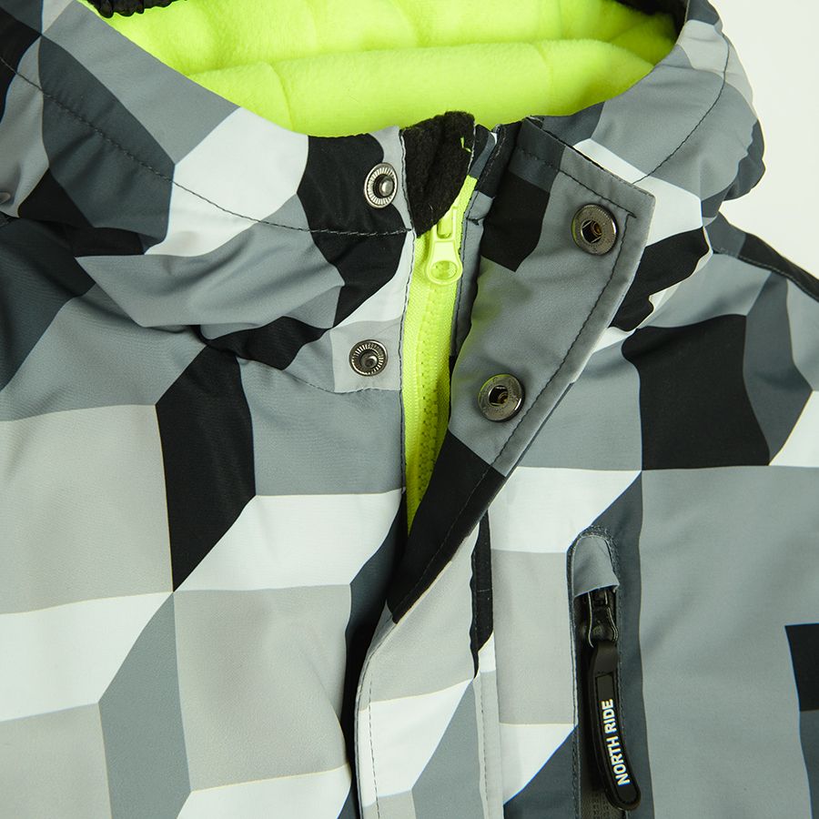 Grey with building blocks print ski jacket with fluo lining on the hood
