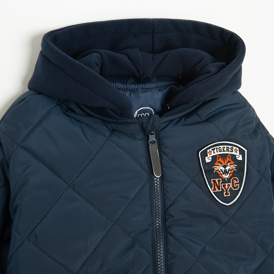 Blue quilted zip through jacket with removable hood