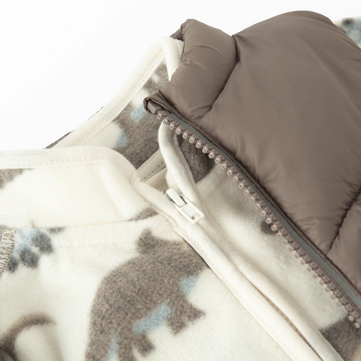 Μπουφάν 2 τμχ ζακέτα fleece λευκή με στάμπα δεινόσαυρους και αμάνικο γιλέκο μπεζ