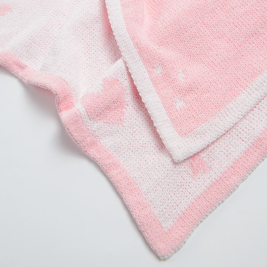 Pink blanket with hearts print