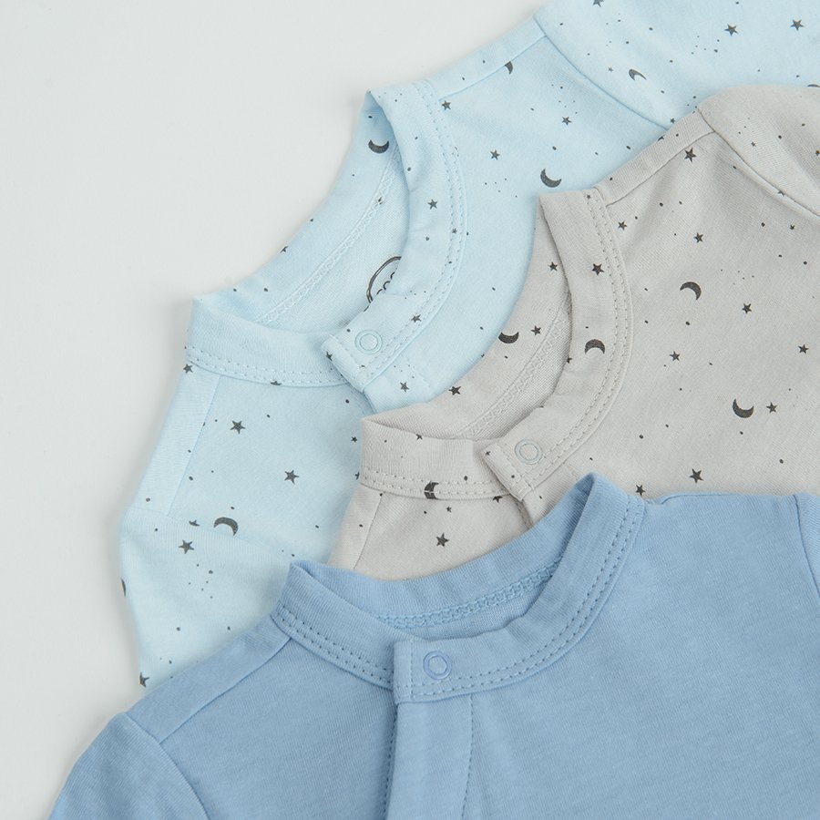 Light blue, blue and grey long sleeve footed overalls with side clips and ILOVE YOU TO THE MOON AND BACK print