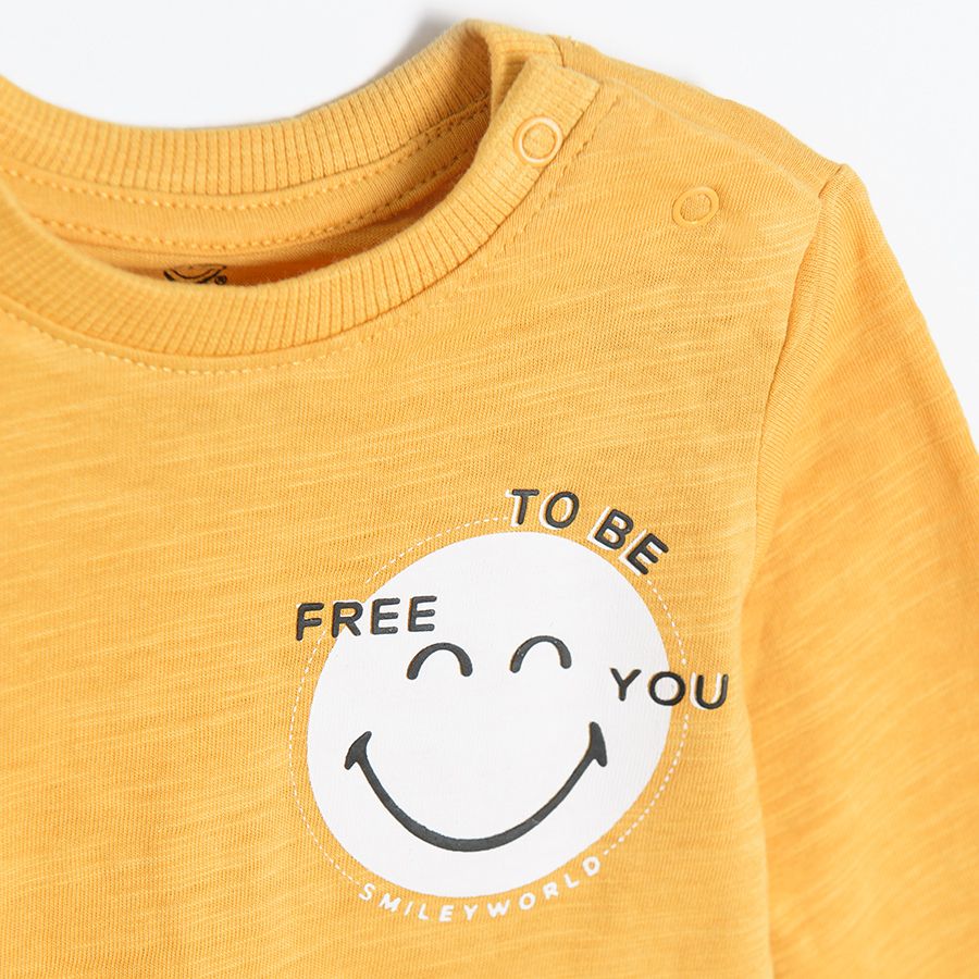 Smiley yellow long sleeve blouse