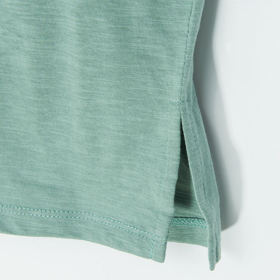 Jurassic World green short sleeve blouse